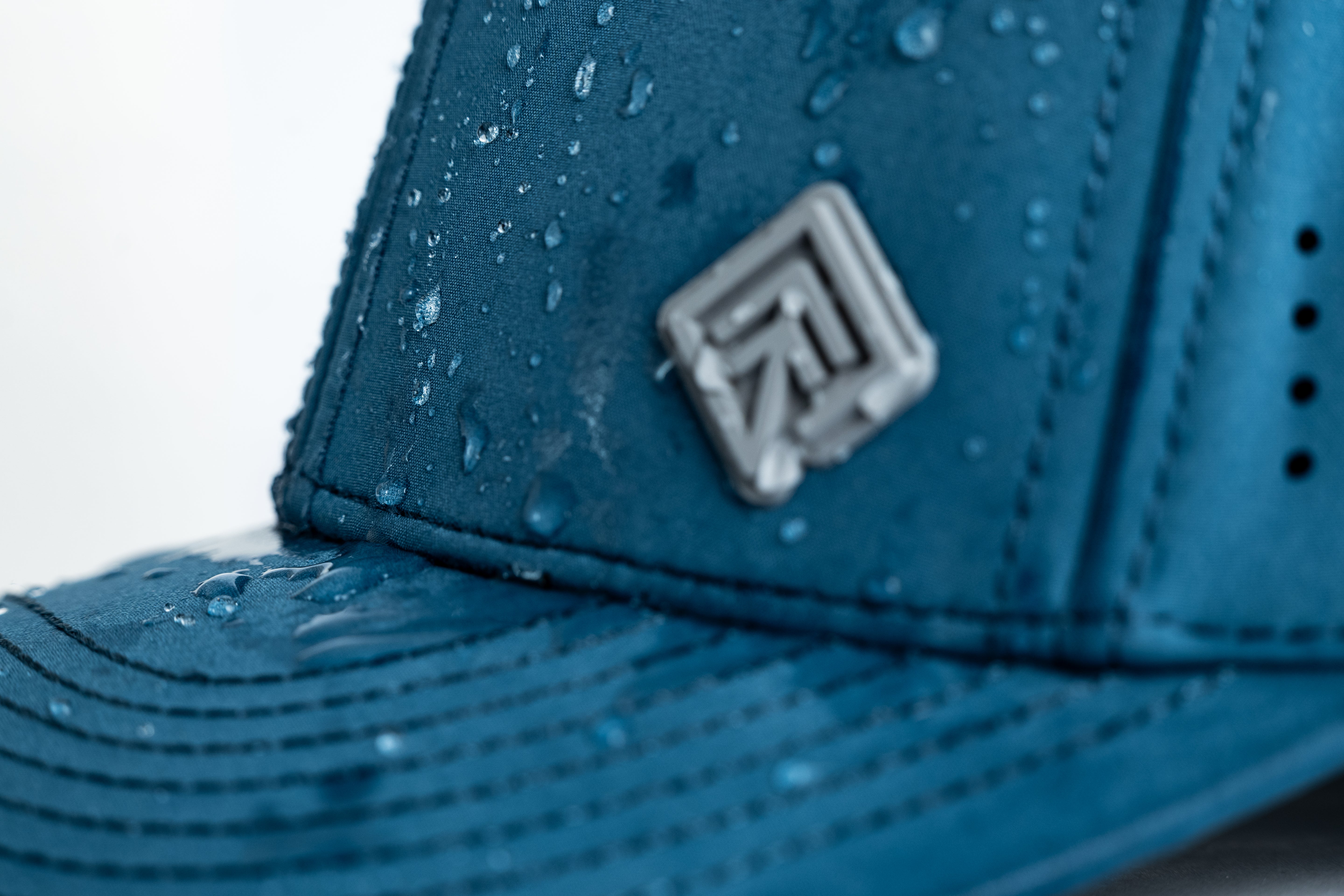 Water-resistant Terreno hat logo closeup
