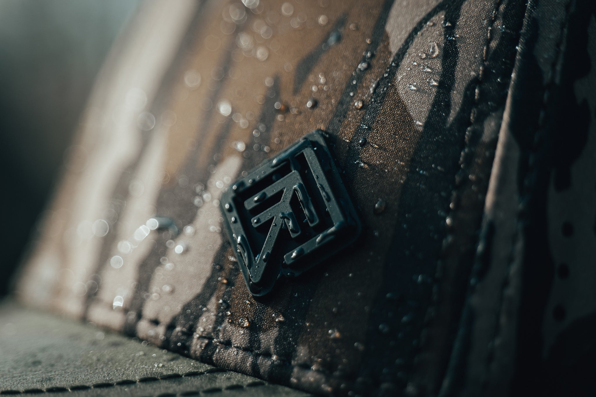 Wet Terreno camo hat logo closeup
