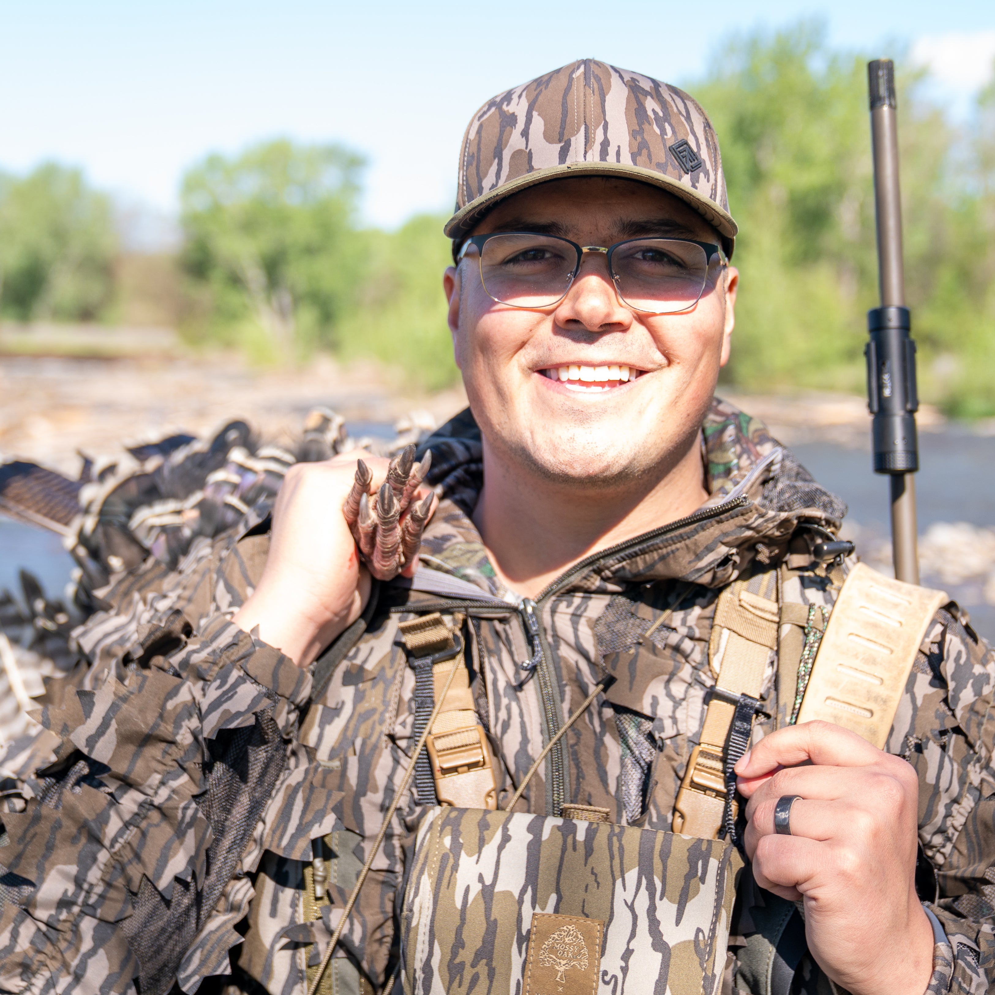 Smiling hunter in camo Terreno hat